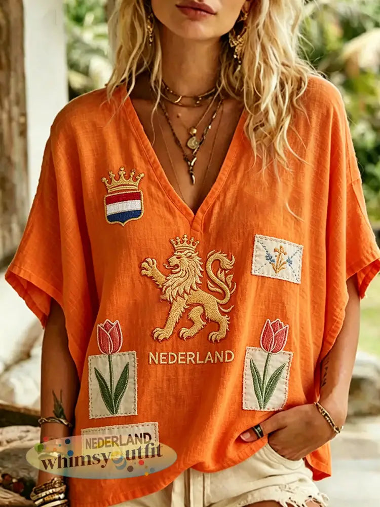 Dames top met leeuwen- en bloemenprint en V-hals - A / S