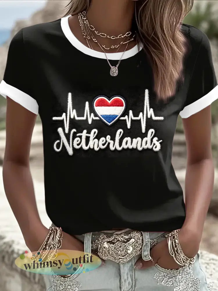 Dameszwart t-shirt met hartendessin en Nederlandse tekst - Wit / S