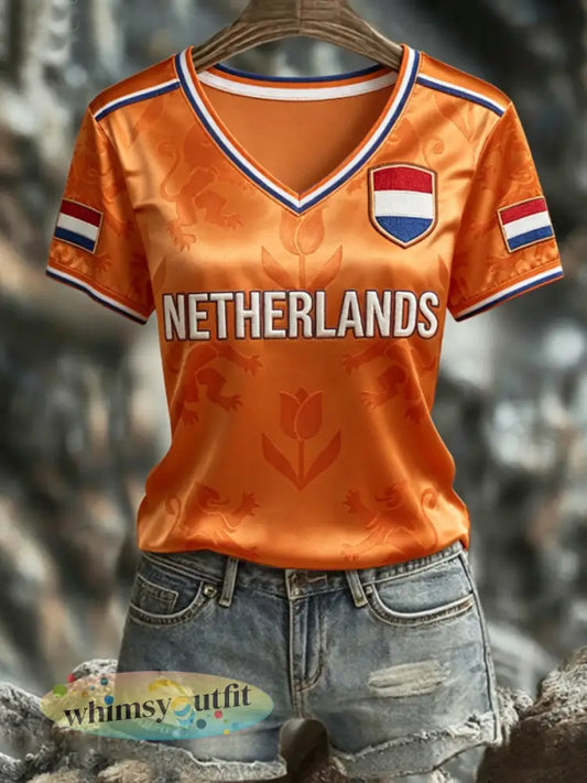 Dames NEDERLAND 2026 voetbal T-shirt met V-hals en korte mouwen van zijde - Sinaasappel / S