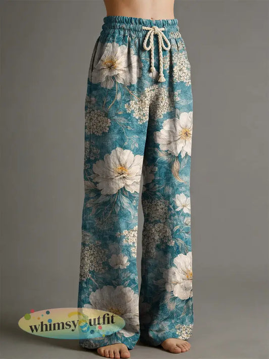 Damesbroek met bloemenartprint - Blauw / S