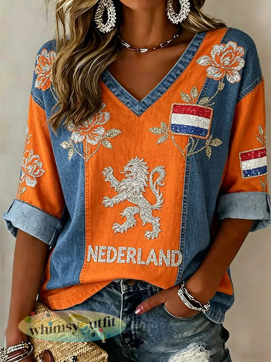 Damescasual top met V-hals en paillettenprint van een leeuw en bloemen - A / S