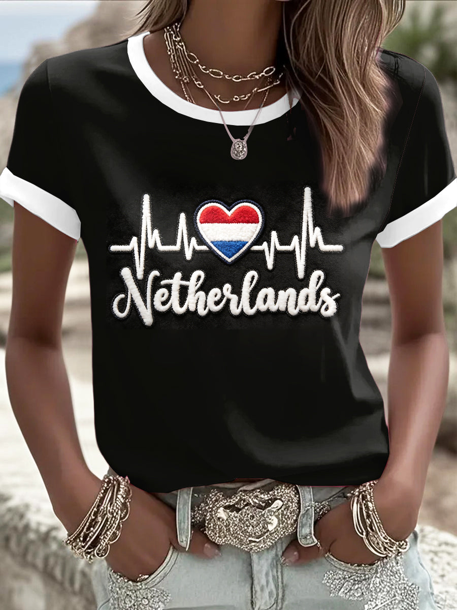 Dameszwart t-shirt met hartendessin en Nederlandse tekst