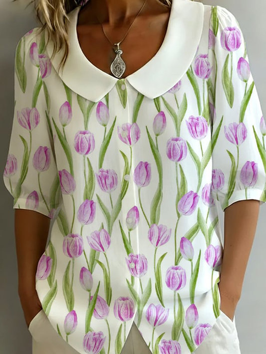 Damesbloes met bloemenmotief, halflange mouwen en popkraag, gemaakt van katoen-linnen mix