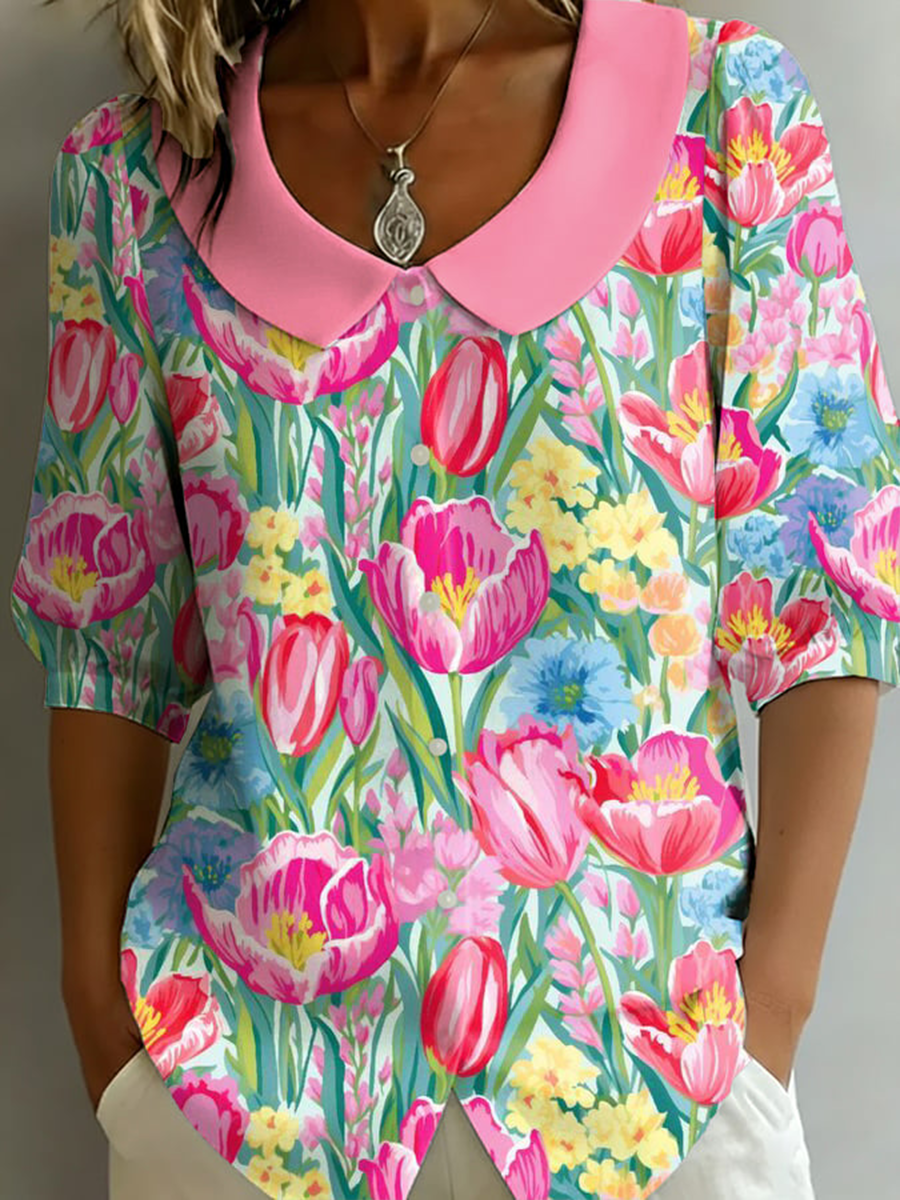 Damesbloes met bloemenmotief, halflange mouwen en popkraag, gemaakt van katoen-linnen mix