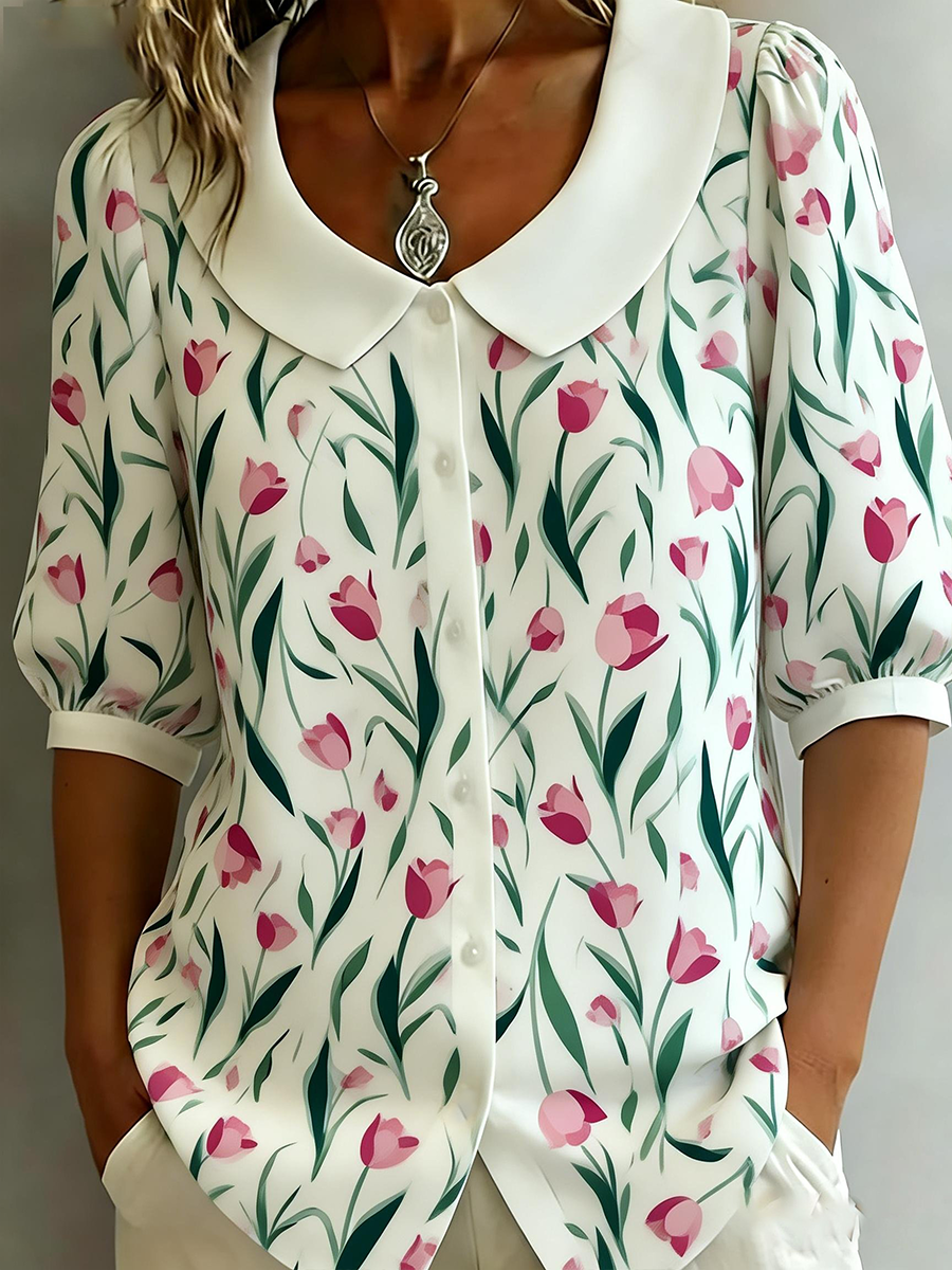 Damesbloes met bloemenmotief, halflange mouwen en popkraag, gemaakt van katoen-linnen mix